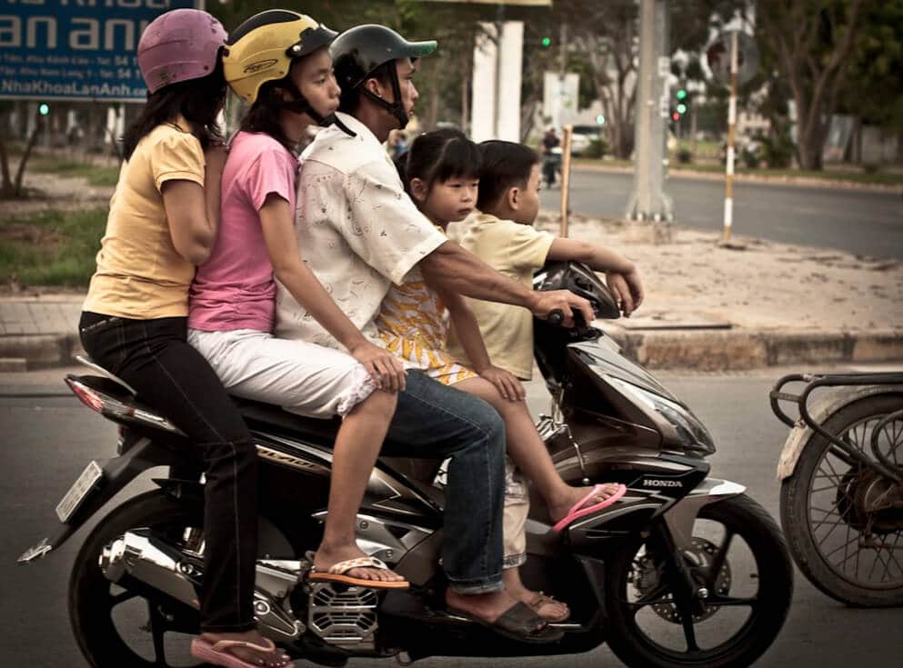 Local Vietnamese in a motorbike - expat in Vietnam